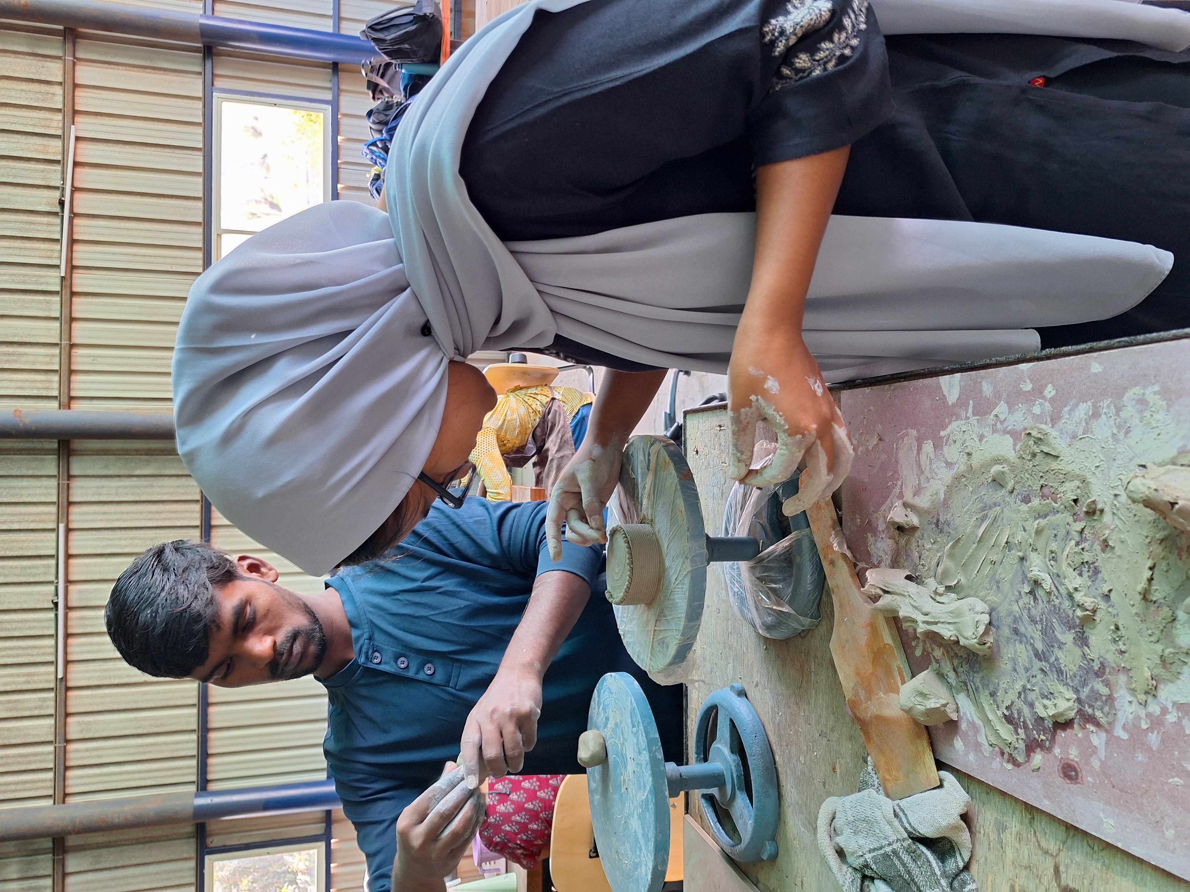 Clay workshop — hands in clay