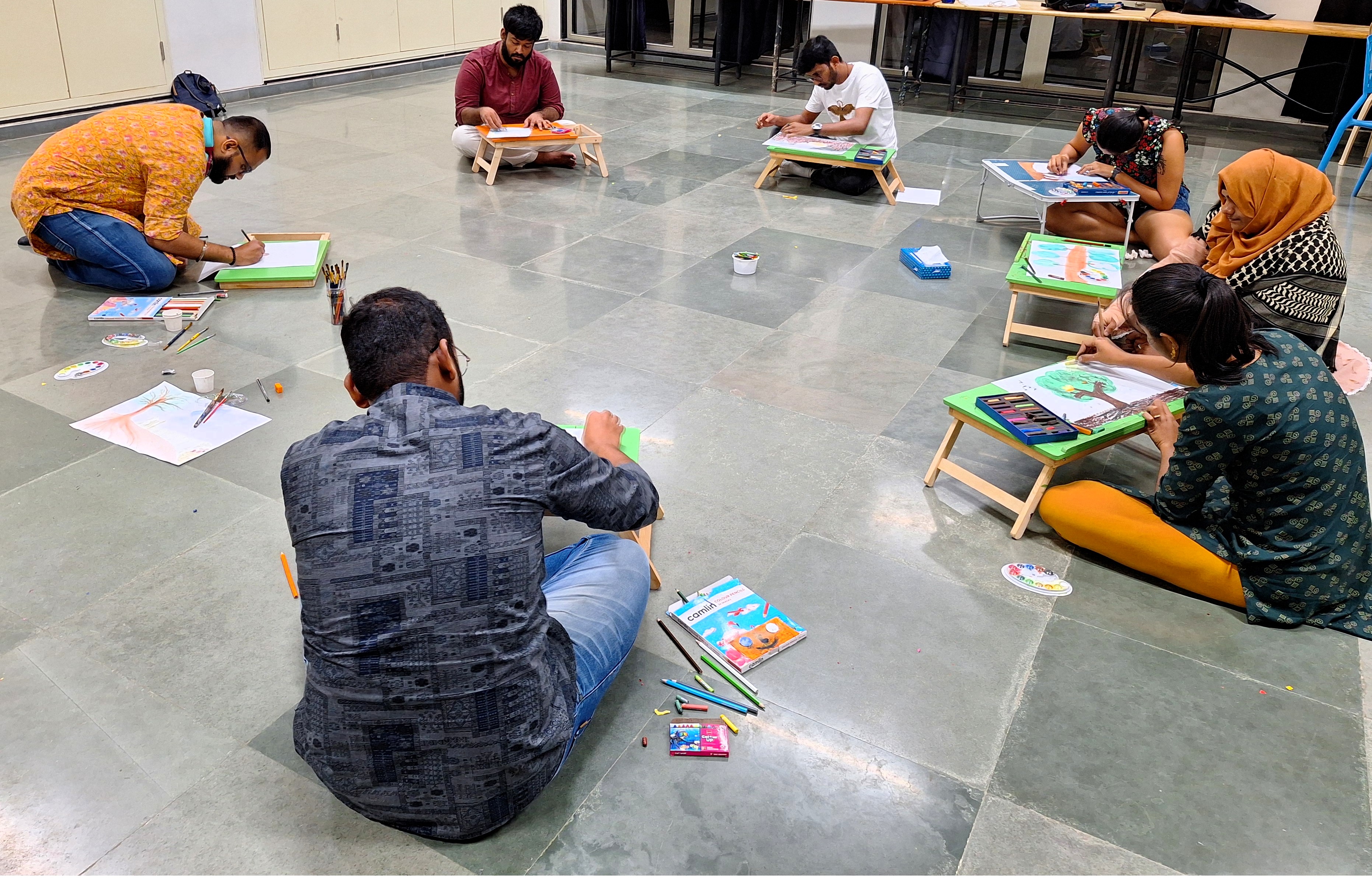 Group drawing — arts therapy session